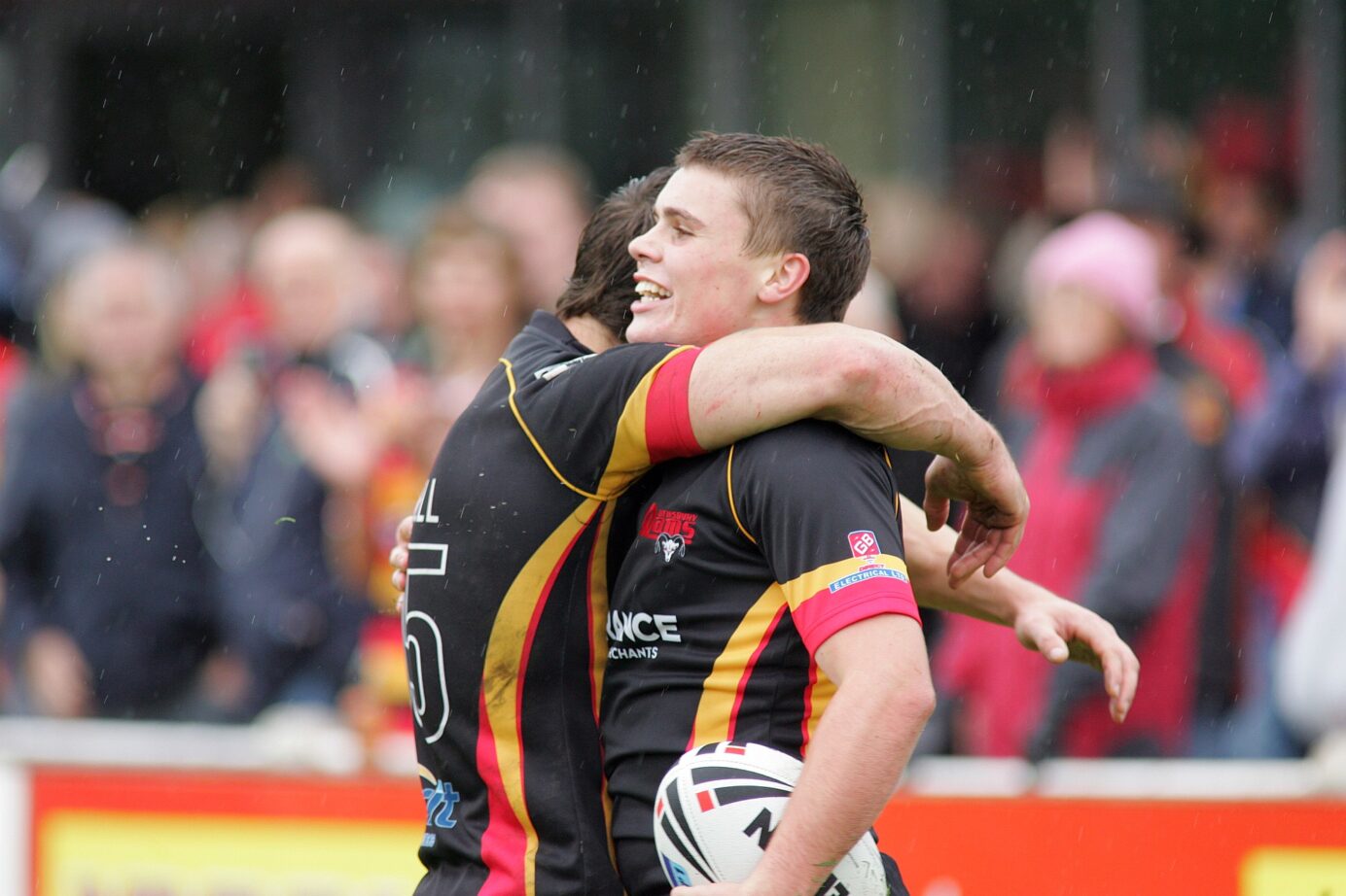 Blackpool v Dewsbury - patch walker gives Josh tonks congrats Josh on his try